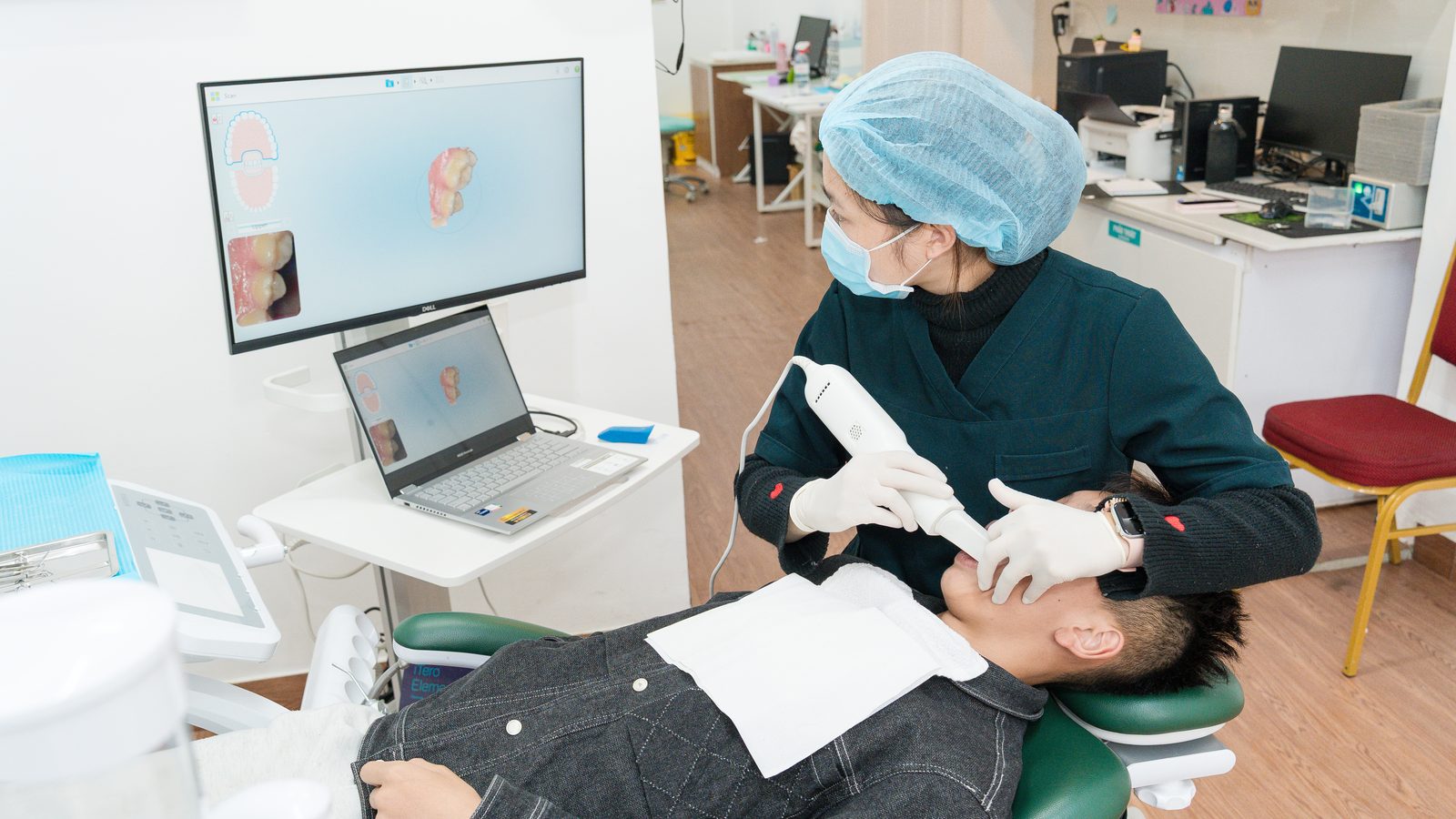 Dentist examining a patient at Picasso Dental Da Lat