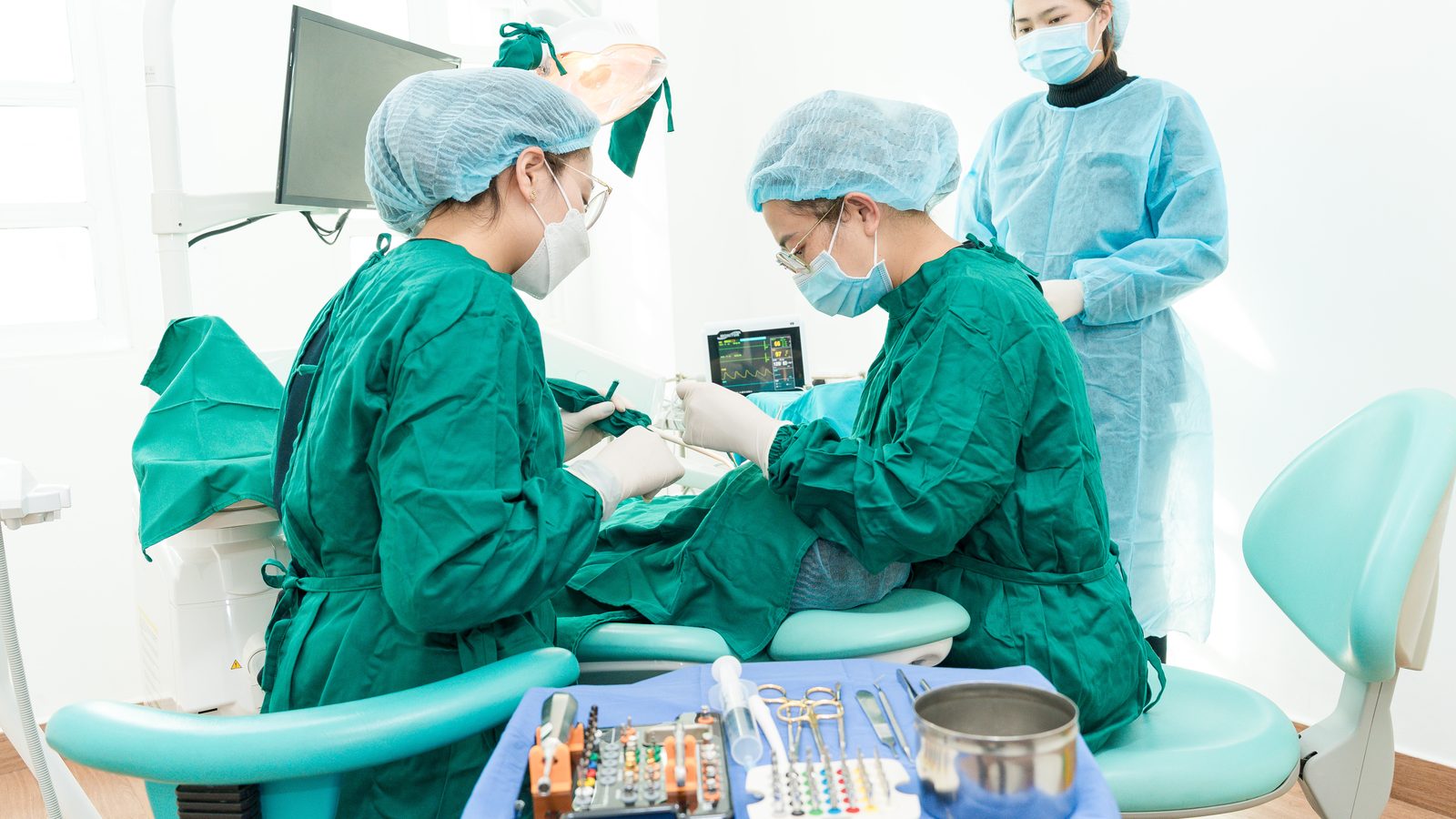 Dental implant surgery in progress at Picasso Link General, Da Lat