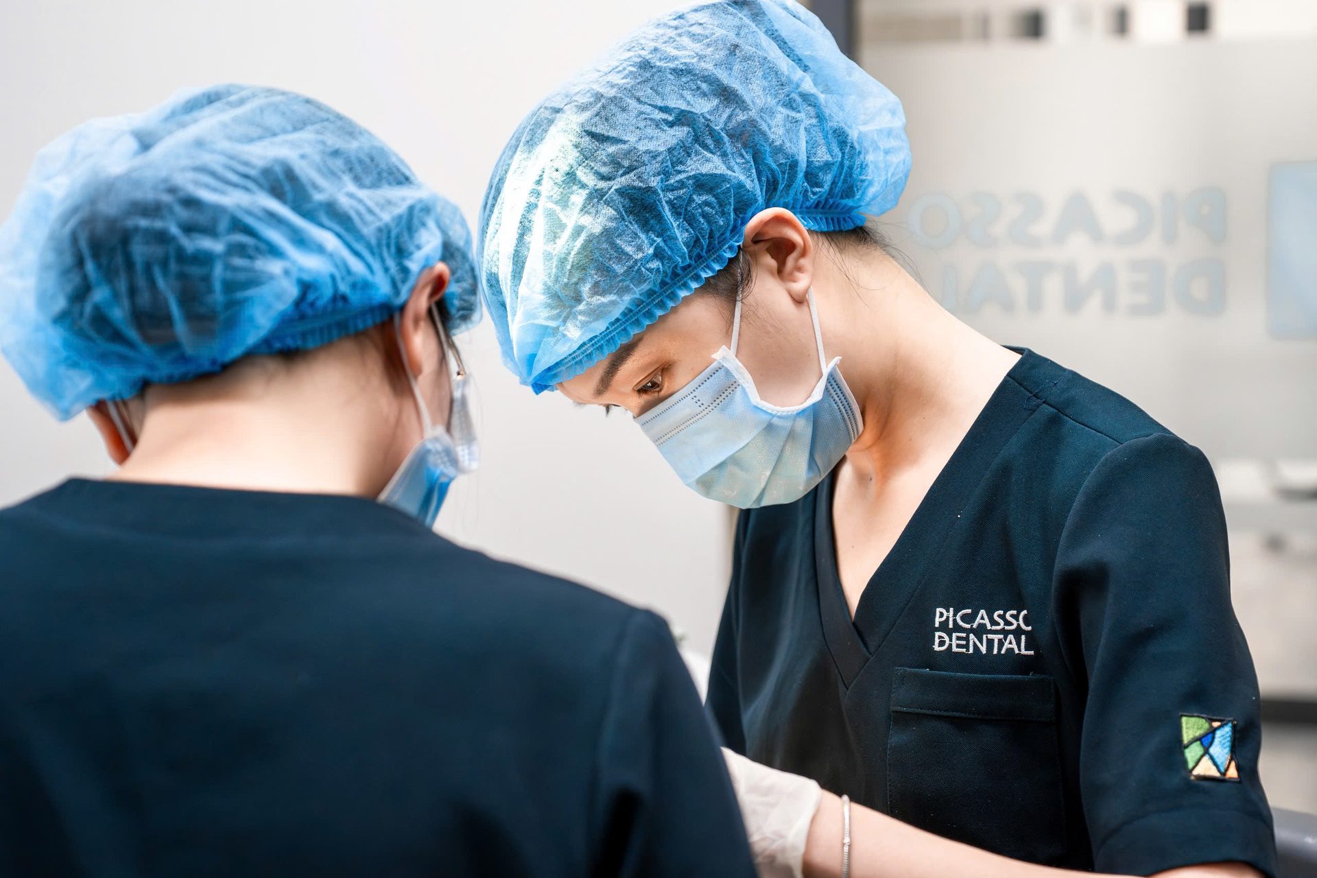 Picasso Dental clinician focused during emergency appointment