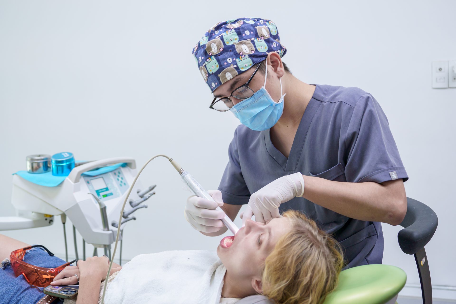 Dentist examining a patient at Picasso Dental