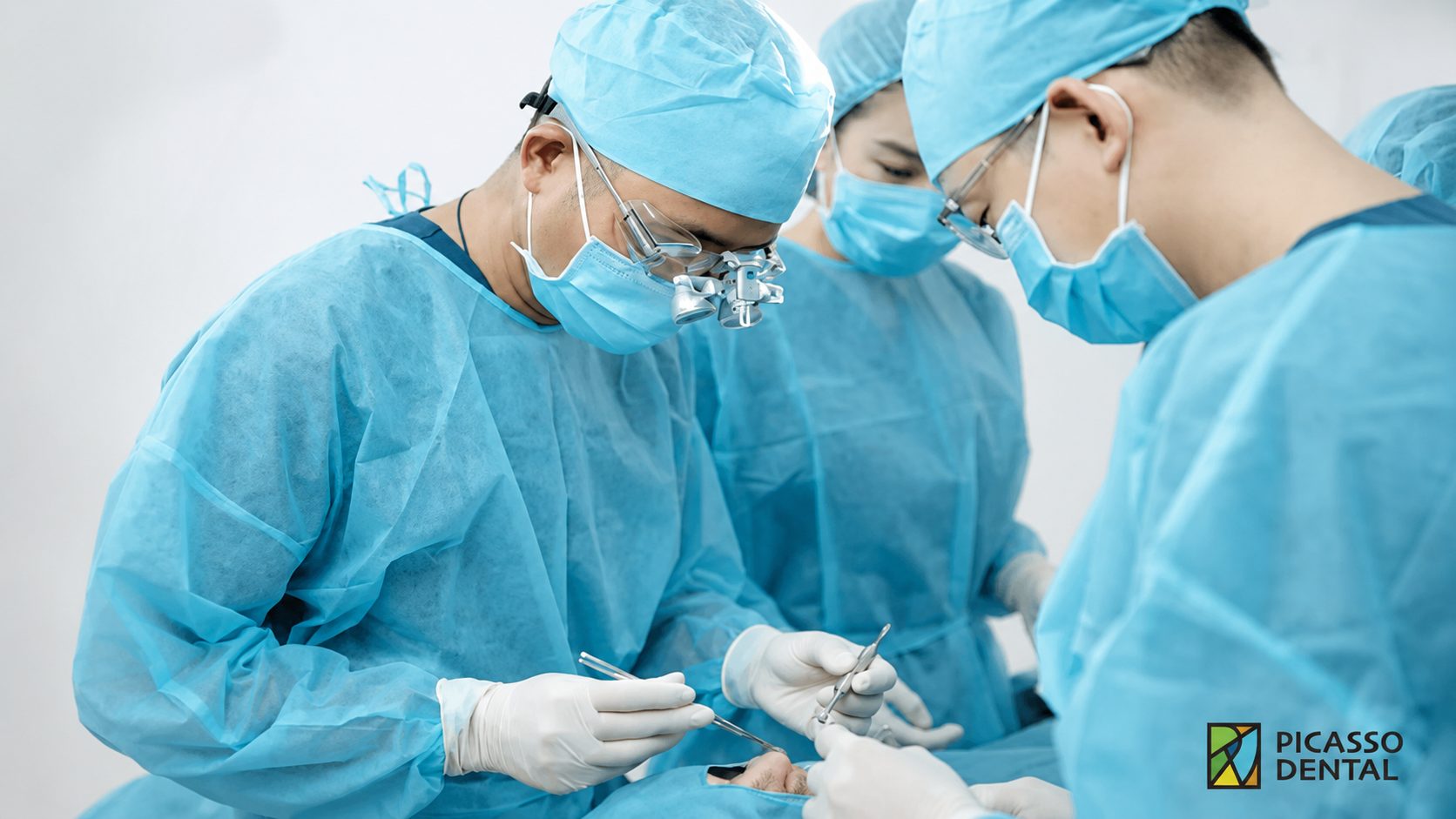 Dental implant surgery under sterile conditions at Picasso Dental